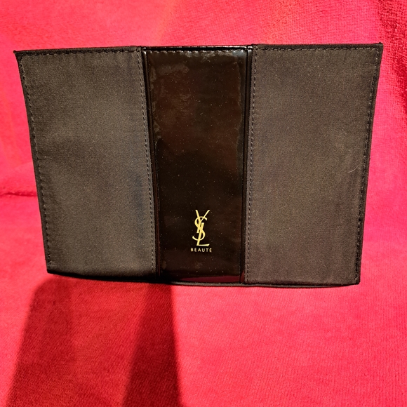 Yves Saint Laurent Handbags - Yves Saint Laurent Black Cosmetic Bag